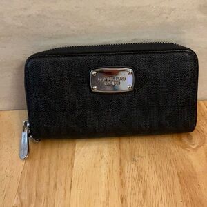 Michael Kors Jet Set Black Zip-Around Wallet with Silver Logo Plate